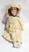 German bisque headed doll inscribed "Germany 0", with blue sleeping eyes, open mouth, moulded teeth,