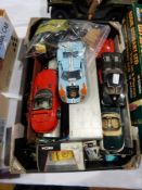 A collection of large diecast toys to include Universal Hobbies 4GT40,