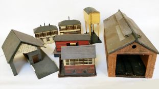 A collection of scratch-built wood railway buildings to comprise an engine shed, a goods depot,