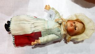 Bisque headed doll marked "2/0" with sleeping blue eyes, open mouth, moulded teeth,