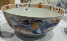 Chinese Imari porcelain bowl painted with figures in rocky landscape with buildings,