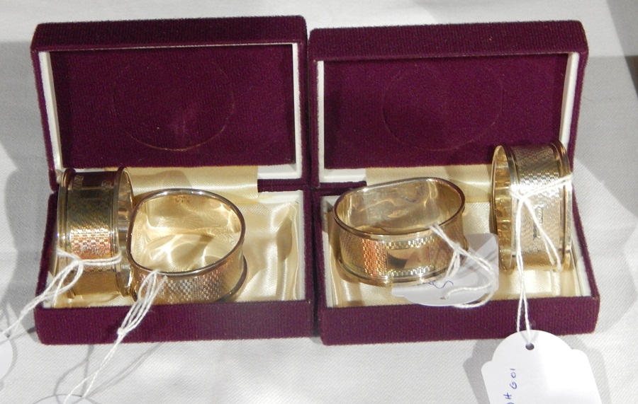 A pair of silver engine turned napkin rings,