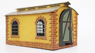 A Bing single road engine shed, brick-effect with two windows to each side,