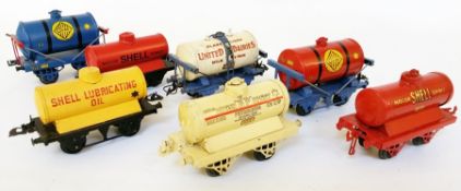 Seven Hornby 'O' gauge tanker trucks for Shell Lubricating Oil, Colas (blue tank), Colas (red tank),