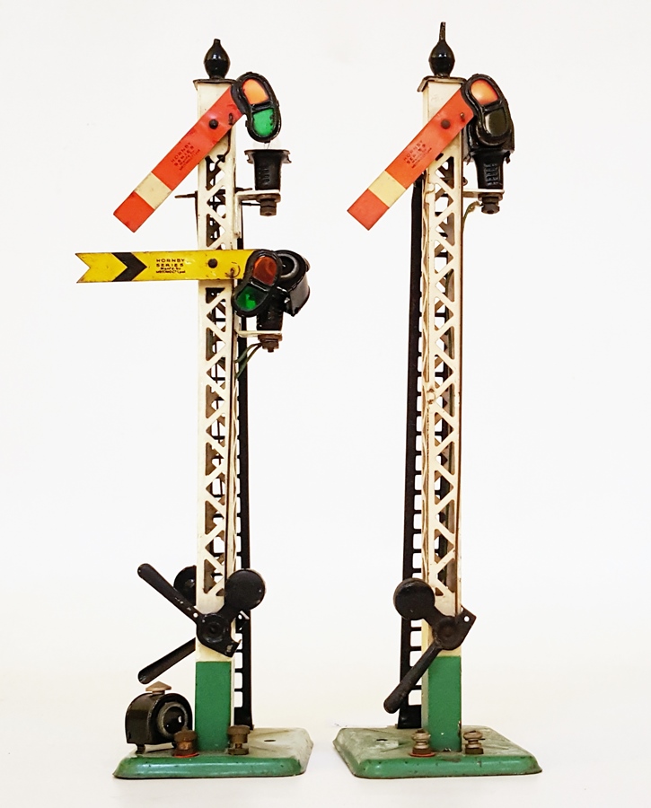 Two Hornby signals with electric lanterns, green bases, black levers,