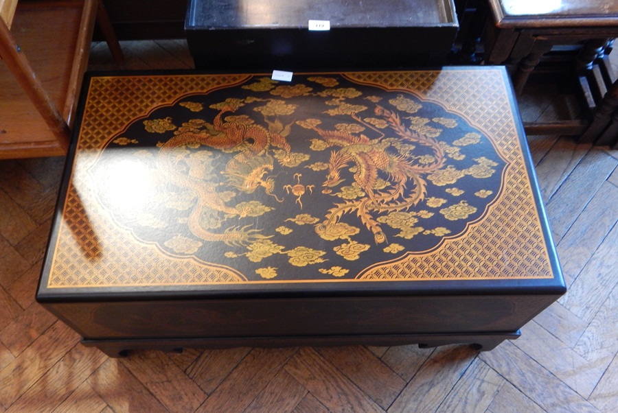 A Chinese lacquerwork style rectangular top coffee table with two frieze drawers,