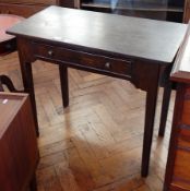 An old oak drop-flap side table with frieze drawer, on square tapering legs,