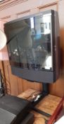 A Bang & Olufsen 19" television with controls,