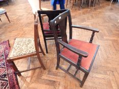 A stained oak splat back armchair with drop-in seat, another similar,