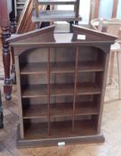A modern display unit of four open shelves,