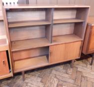 A circa 1960's hardwood bookcase with glazed sliding doors, cupboard below,