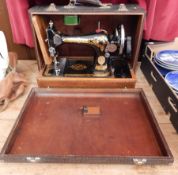 A cased early Singer sewing machine, No.