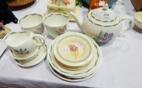1950's Susie Cooper tete-a-tete viz teapot, two cups and saucers, tea plate, spoon rest, cream jug,