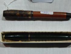A Parker Duofold fountain pen and another pen