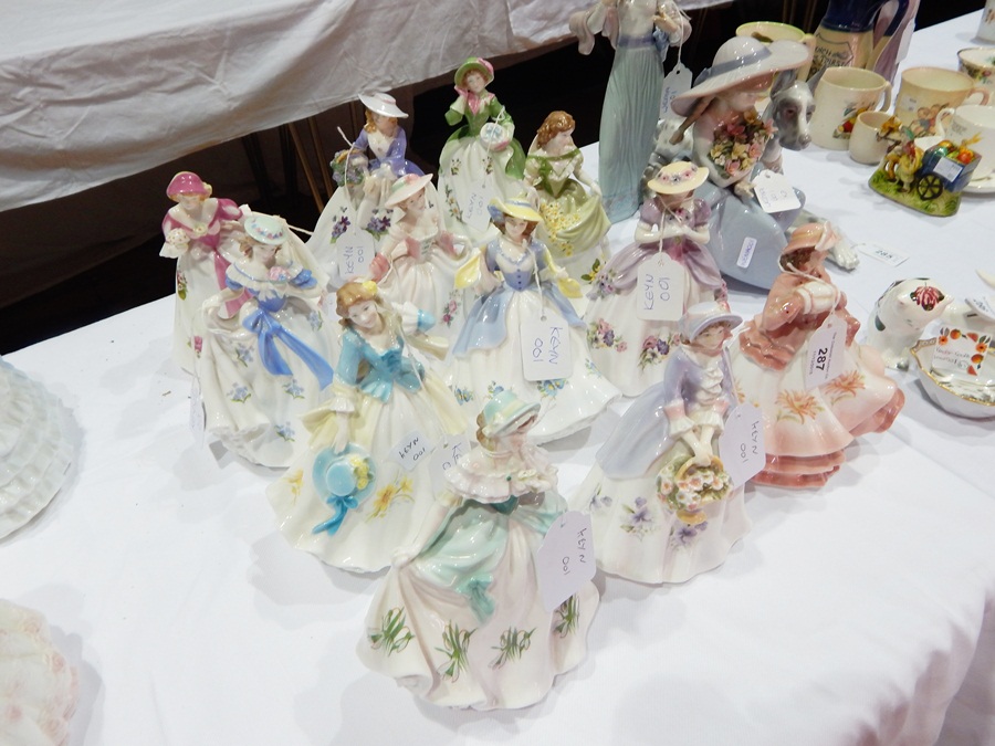 A set of 12 limited edition Royal Worcester flower figures