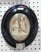 Bing and Grondahl porcelain relief moulded plaque of classical scene, framed and glazed,