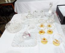 A quantity of glass to include a set of six amber and clear glass champagne saucers,