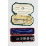 A lady's silver etui comprising scissors, thimble, needle case and nail file by Aspreys,
