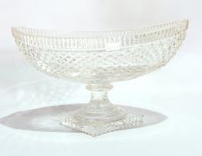 Late 19th/early 20th century cut glass oval pedestal dish, boat-shaped, on stepped rectangular base,