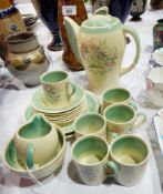 Early 20th century Susie Cooper pottery coffee set having green shaded borders and stylised floral
