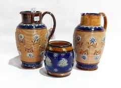 Pair Doulton Lambeth stoneware jugs, each shouldered and tapering, decorated in blue,