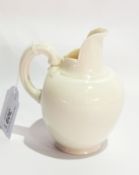 Victorian Royal Worcester ivory porcelain jug, ribbed handle to slightly flattened ovoid body (af),
