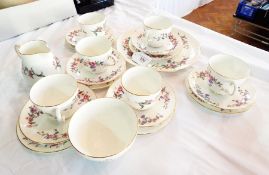Wedgwood bone china part tea service with gilt border and floral decoration