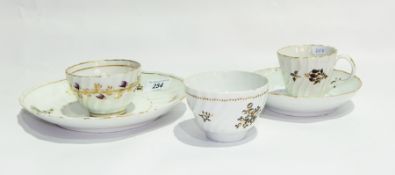 18th century English porcelain tea bowl and saucer painted to the wrythen body in sepia and gilt