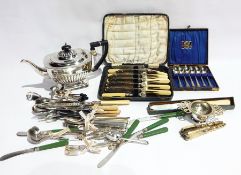 A quantity of silver plate to include a teapot, set of six bead pattern coffee knives,