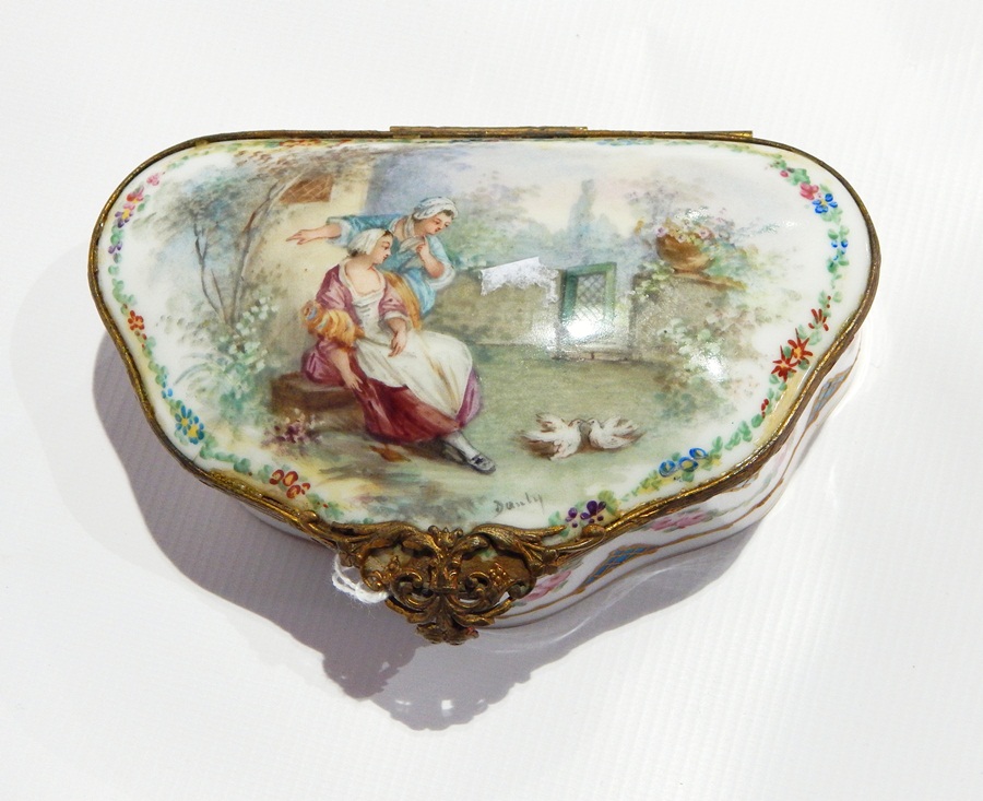 A 19th century Sevres porcelain and ormolu trinket box with serpentine front edge,