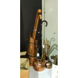 A collection of copper kettle,