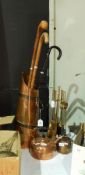 A collection of copper kettle,