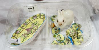 A French porcelain miniature teaset with yellow field and floral decoration and a USSR model rabbit