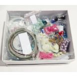 A quantity of costume jewellery to include bead necklaces,