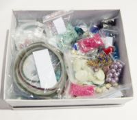 A quantity of costume jewellery to include bead necklaces,