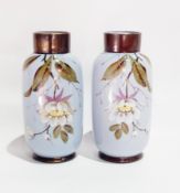 A pair of Edwardian opaline glass vases of shaped straight sided form having purple ground with