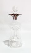 A glass glug-glug decanter and stopper with silver plated mounts,