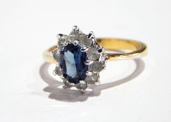 A blue and white stone cluster ring,