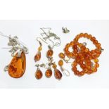 A quantity of amber earrings,