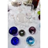 A quantity of glassware to include cut glass jug, bottle decanter, specimen vases,