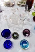 A quantity of glassware to include cut glass jug, bottle decanter, specimen vases,