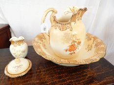 Victorian Doulton Burslem pottery ewer and basin having scroll handle to the oblate ewer,