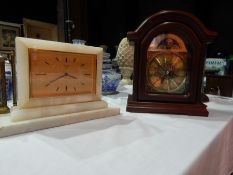 A modern Bentima reproduction bracket clock with quartz movement and a mid 20th century marble