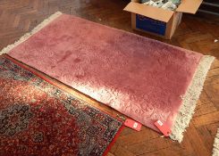 Chinese pink ground wool rug with embossed detail, rectangular,