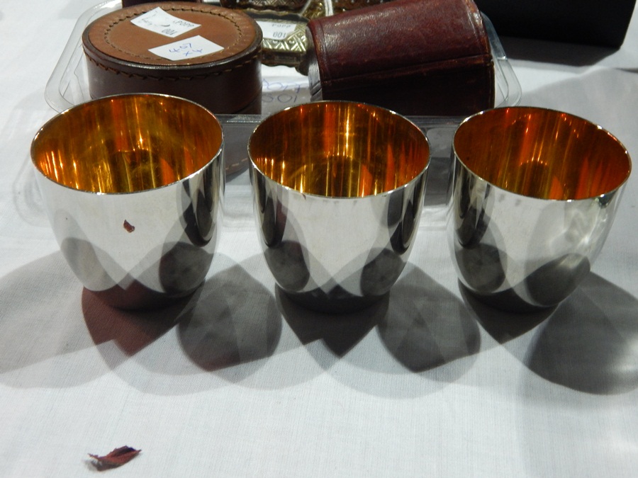 A set of three hunting cups,