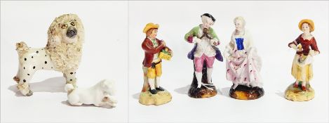 Pair of 19th century Staffordshire figures of man and woman collecting fruit, 13 cms high,