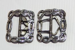 A pair of Georgian silver shoe buckles with bright cut engraving and steel fasteners