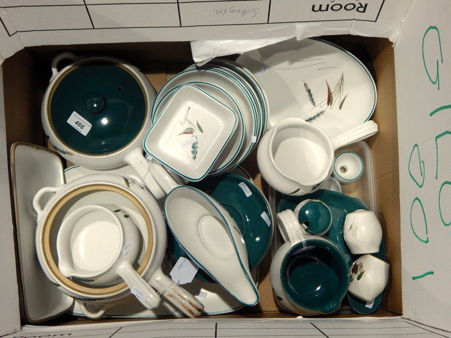 A large quantity of Denby "Green Wheat" pattern tea and dinnerware including covered casseroles,