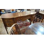 George III style mahogany sideboard, serpentine fronted, with central drawer flanked by cupboard and