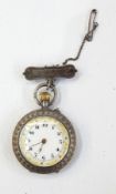 Lady's continental silver fob watch with gilded enamel dial, button winding, on bar suspension,